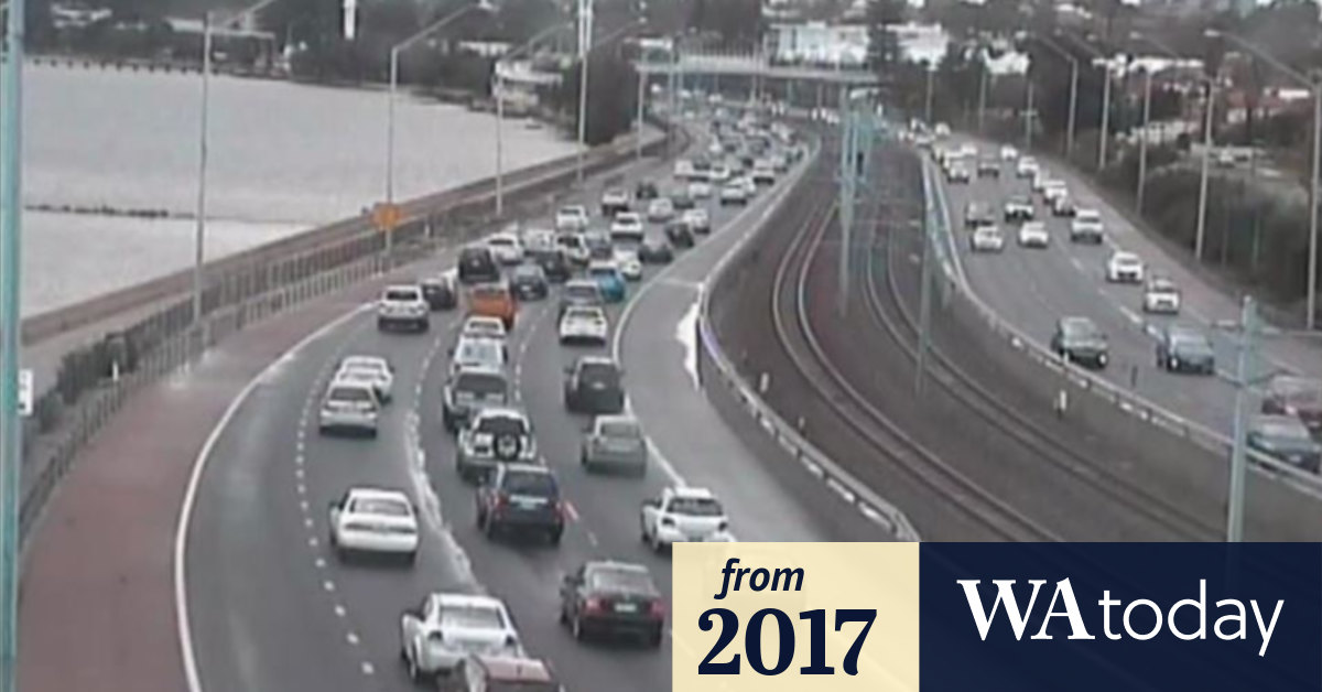 Power pole falls across Great Eastern Highway after car crash